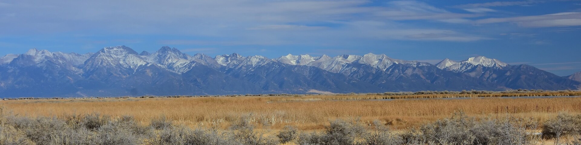the spectacular sangre de cristo mountains on a sunny winter day, as seen from highway 285 in southern colorado, near moffat