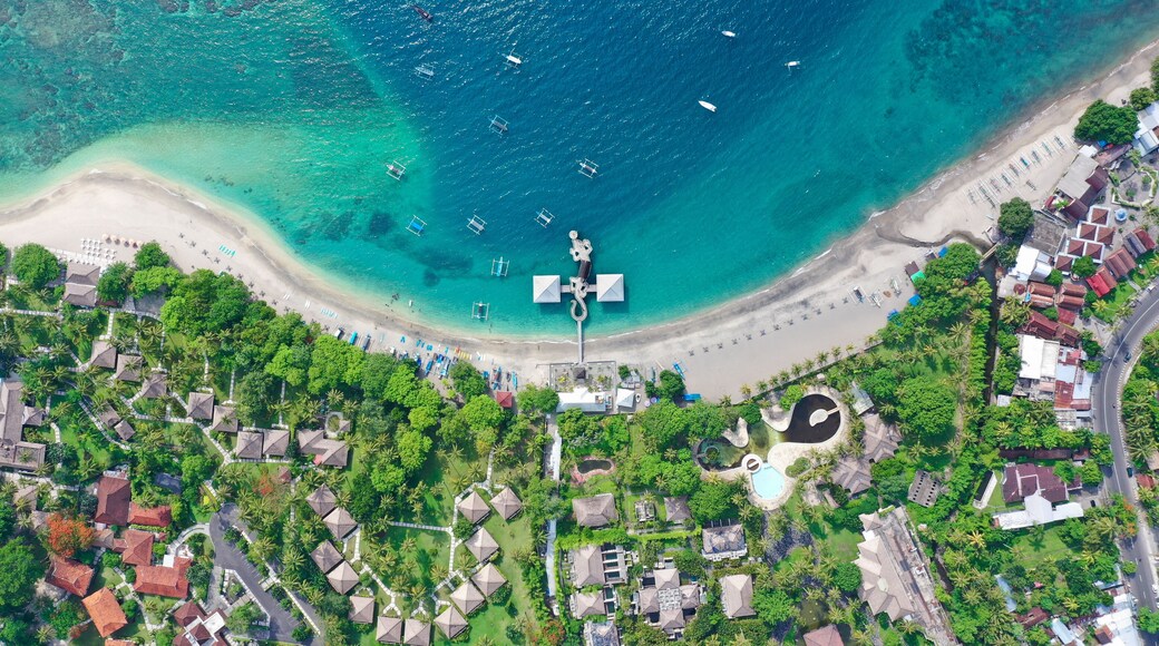 One of the most under-rated beaches in Indonesia. This amazing beach has a gecko shaped ferry terminal, uncrowded white sand beaches, great surf and snorkeling, the water is clean and cool with a shark tooth shaped deep water bay. good for SUP, locals & expats go to great lengths to keep it pollution and trash free