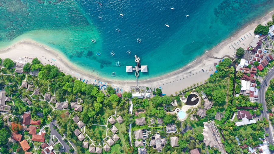 One of the most under-rated beaches in Indonesia. This amazing beach has a gecko shaped ferry terminal, uncrowded white sand beaches, great surf and snorkeling, the water is clean and cool with a shark tooth shaped deep water bay. good for SUP, locals & expats go to great lengths to keep it pollution and trash free