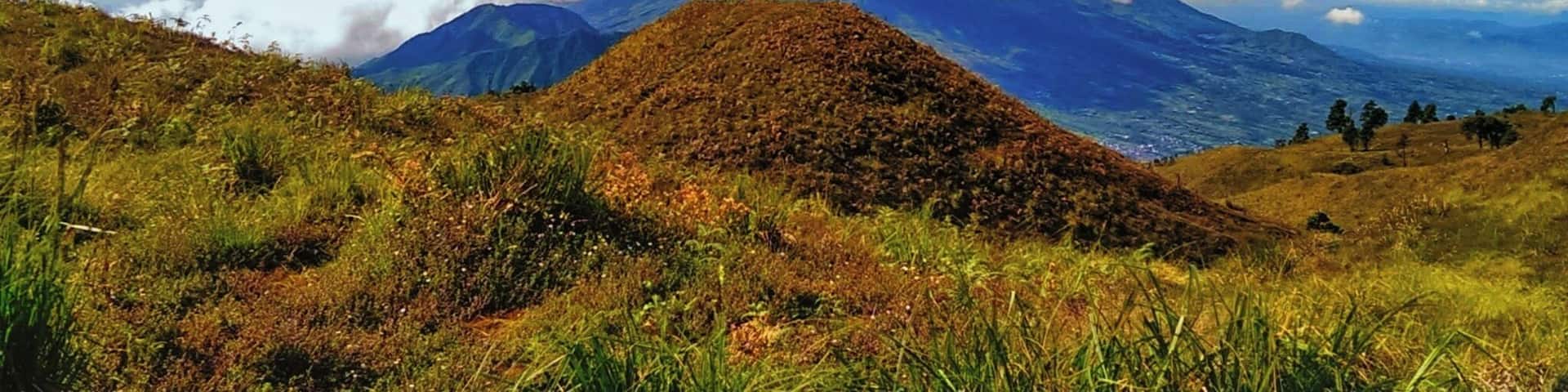 View of Mount Sindoro and Mount Sumbing from Mount Prau. April 2015.
