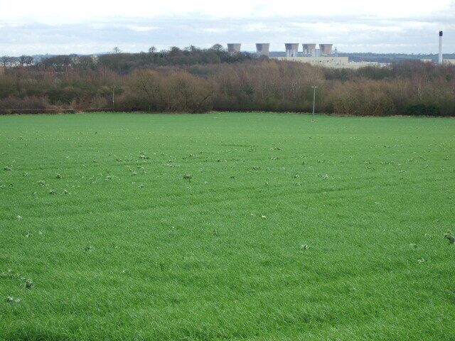 Arable field Looking across the grid square with the Toyota Car Factory in the background.