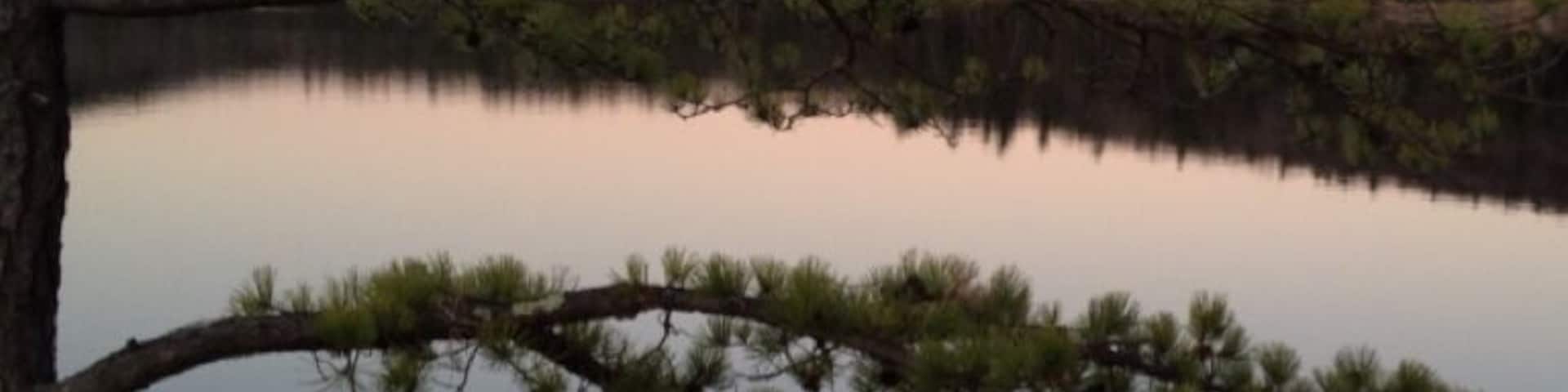 One of Connecticut's state parks that has some of the most beautiful views. You can enjoy a picnic with the family, hike through one of the many trails or swim, fish, or kayak in the serene waters. This picture was taken off one of the small islands (not privately owned) located in the middle of Mashapaug Lake
