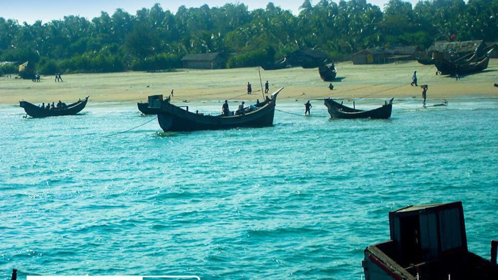 St. Martin's Island (Bengali: সেন্ট মার্টিন্স দ্বীপ) is a small island (area only 8 km) in the northeastern part of the Bay of Bengal, about 9 km south of the tip of the Cox's Bazar-Teknaf peninsula, and forming the southernmost part of Bangladesh. There is a small adjoining island that is separated at high tide, called Chera Dwip. It is about 8 kilometres (5 miles) west of the northwest coast of Myanmar, at the mouth of the Naf River.
The first settlement started 250 years ago by Arabian sailors who named the island 'Jazeera'. During the British occupation, the island was named St. Martin Island. During the First Anglo-Burmese War between the British and Burmese empires in 1824–1826, rival claims to the island were a major factor. The local names of the island are "Narikel jinjira" which means 'Coconut Island' in Bengali, and "Daruchini Dwip". It is the only coral island in Bangladesh.
https://en.wikipedia.org/wiki/St._Martin's_Island