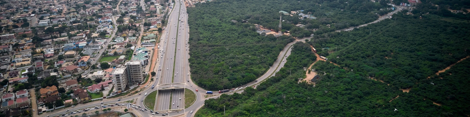 Bird's eye view of the Achimota forest with a highway traffic