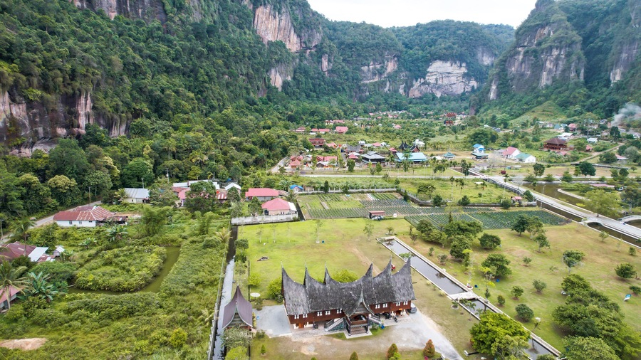 Aerial view of Minangkabau house or Rumah Gadang in a beautiful landscape view of Harau Valley with mountains valley and grass view, Beautiful Minangkabau.