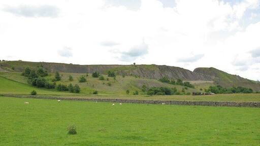 Haw Park Quarry This huge limestone quarry is now disused, apart from a section used for landfill. The typical horizontally bedded dales limestones are here turned almost vertical due to local faulting.