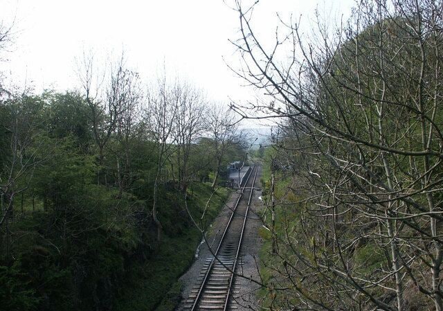 Railway station Holywell Halt from the road bridge which is Holywell Bridge.