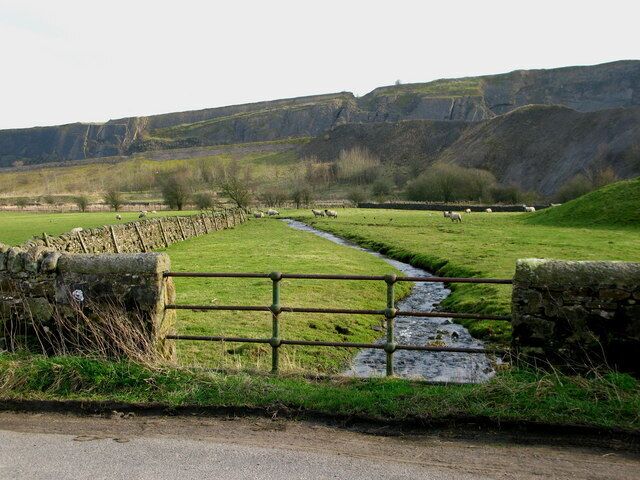Kempley Beck On its way to join Haw Beck. Skipton Rock Quarry is in the background.