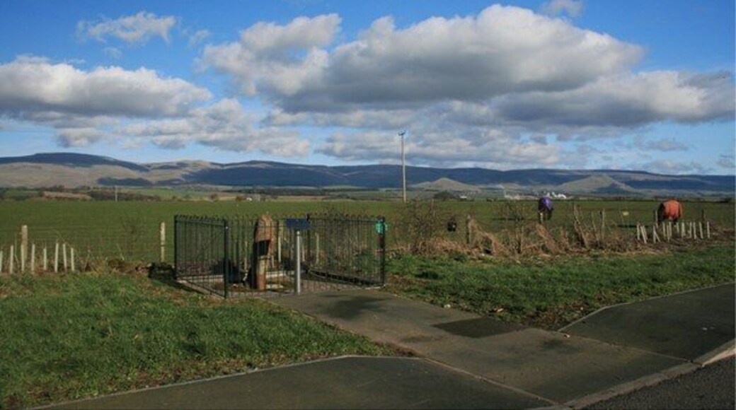 Roman Milestone (In Context) Adjacent to a layby on the A66. Dufton Pike can be seen in the far right distance between the two horses.