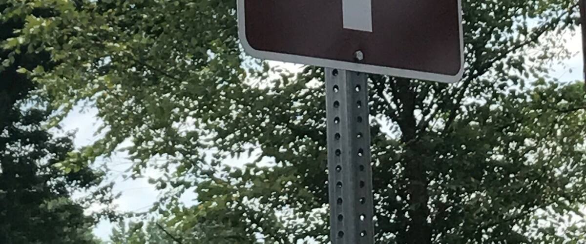 A sign for Harriet Tubman Underground Railroad Byway with a directional arrow.