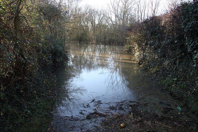 Priest Hill Looking south on what's normally the road down Priest Hill to Little Marsh and The Foss, flooded after recent heavy rain