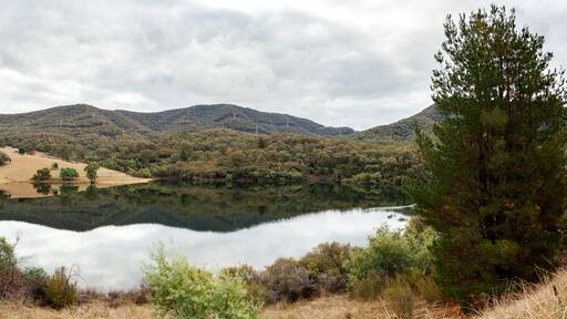 Hills reflected in still water of Jounama Pondage, Talbingo, NSW