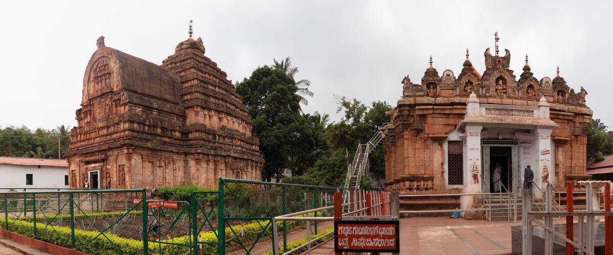 A temple with intricate carvings and a large dome.