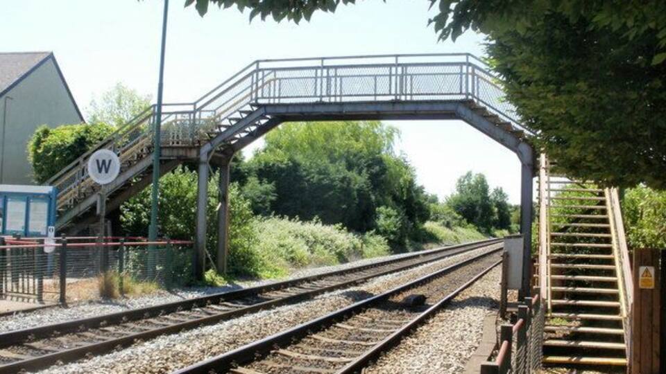 Eastbrook railway station footbridge. Located at the southwest end of the station, the footbridge connects the two platforms and gives a short cut from Cardiff Road to Chamberlain Row.