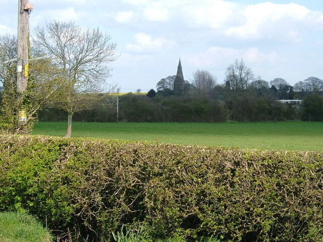 A field at Austrey, Warwickshire, with St Nicholas' parish church beyond