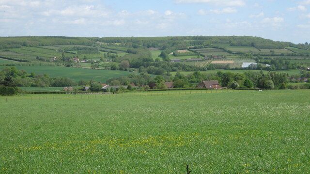 View from Yopps Green This is looking over the patchwork of fields on the River Bourne Valley.
