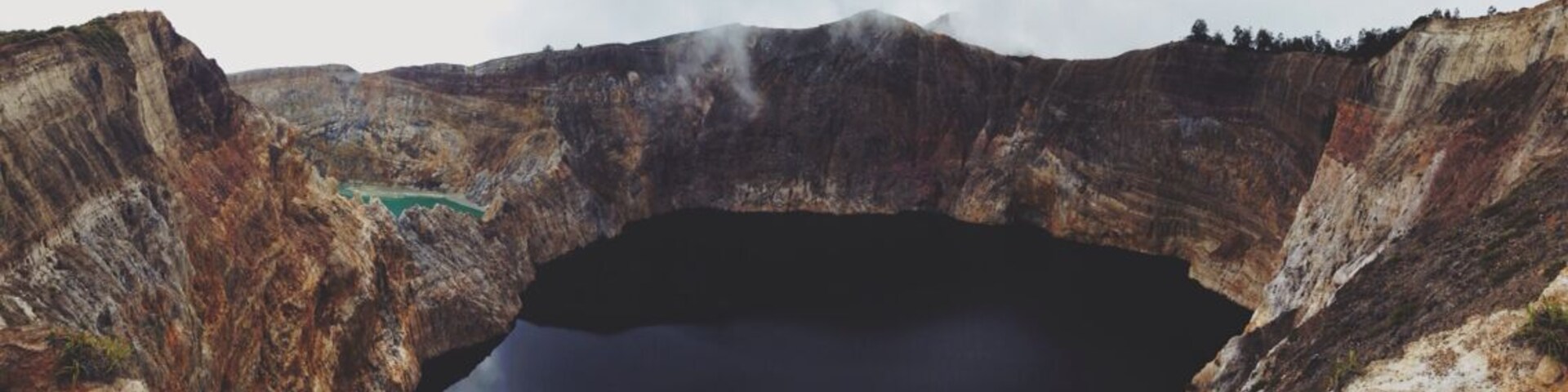 The colored lakes of Kelimutu are something amazing. The chemicals inside make the lakes change colors suddenly about every year. Right now they are brown/black, green and blue. Skip the sunrise or wait until the sun is up to see the lakes in full color!
#kelimutu #moni #flores #indonesia