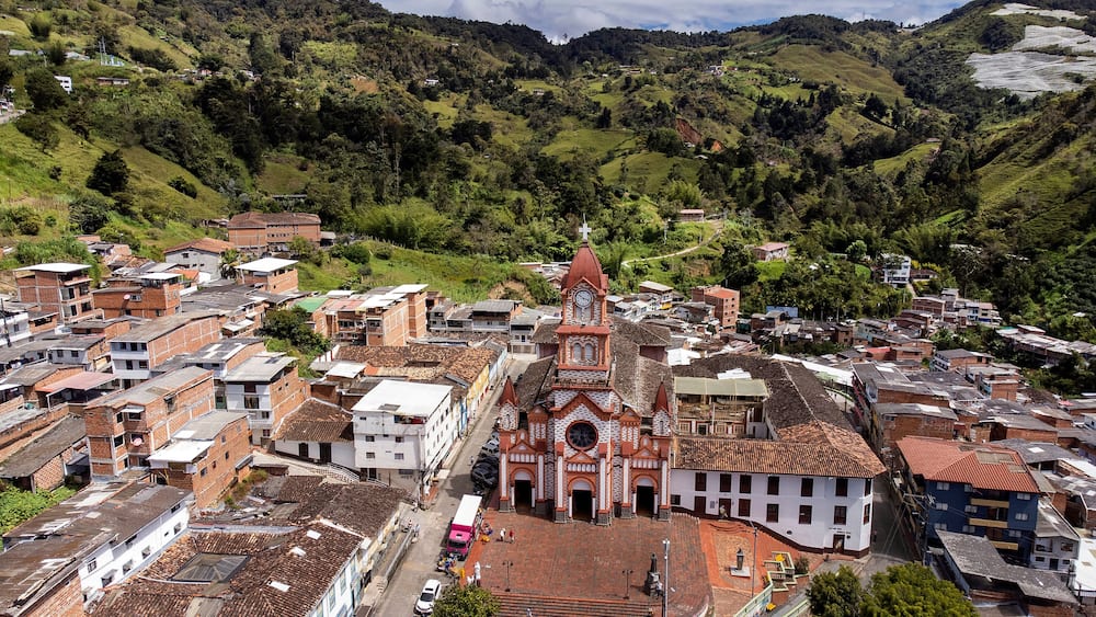 Granada, Antioquia - Colombia. June 28, 2025. Panoramic drone view of the town's main church
