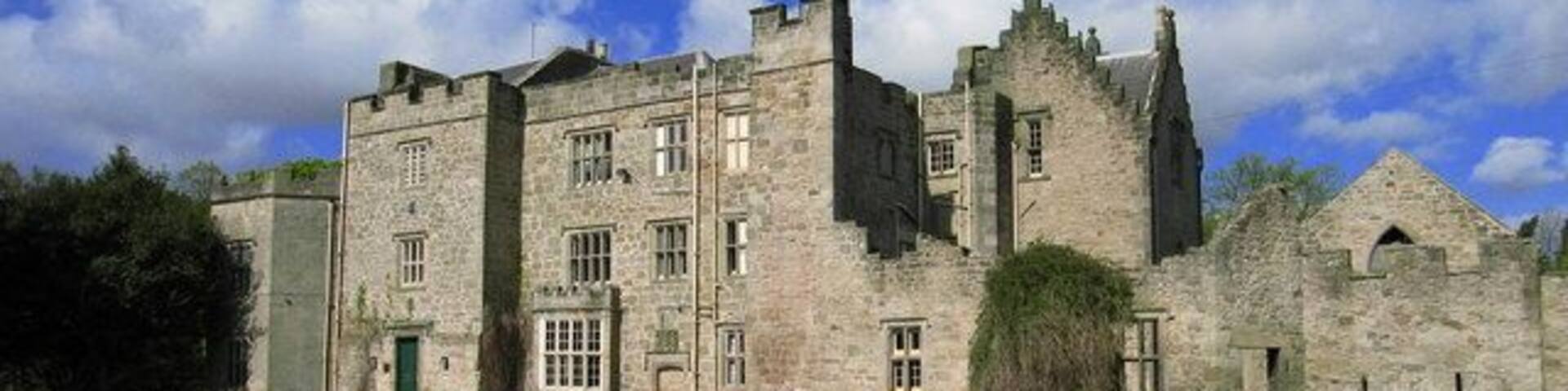 Rock Hall School. A former Jacobean manor house with two wings added by the Victorian architect John Dobson. The Hall stands in its own ground of 5 acres and has been in the Bosanquet family for nearly two centuries. It now is used as a school.