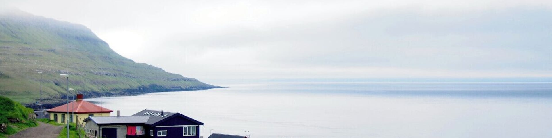 The Faroese village of Nólsoy is a mere 20-minute ferry ride from the capital city of Tórshavn. At only 20 kr each way and with several ferries sailing to and from the island each day, it makes for a great day trip. #TroverDetour