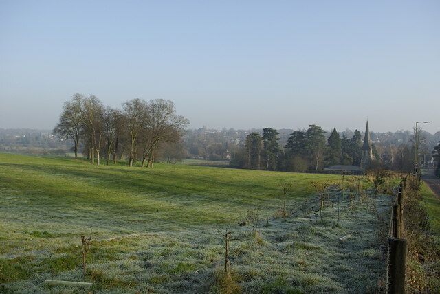 A field at Hunton Bridge, Langleybury, Hertfordshire, with the spire of St Paul's parish church on the right in the middle distance