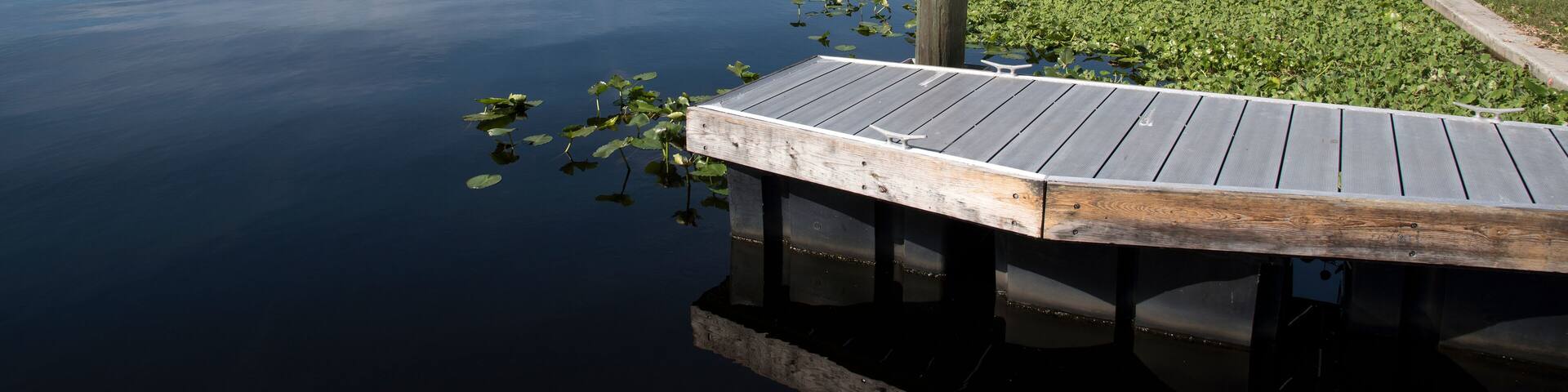 St Johns River in Volusia County Florida USA - October 2016 - A metal landing stage on the St Johns River close to DeLand Fl