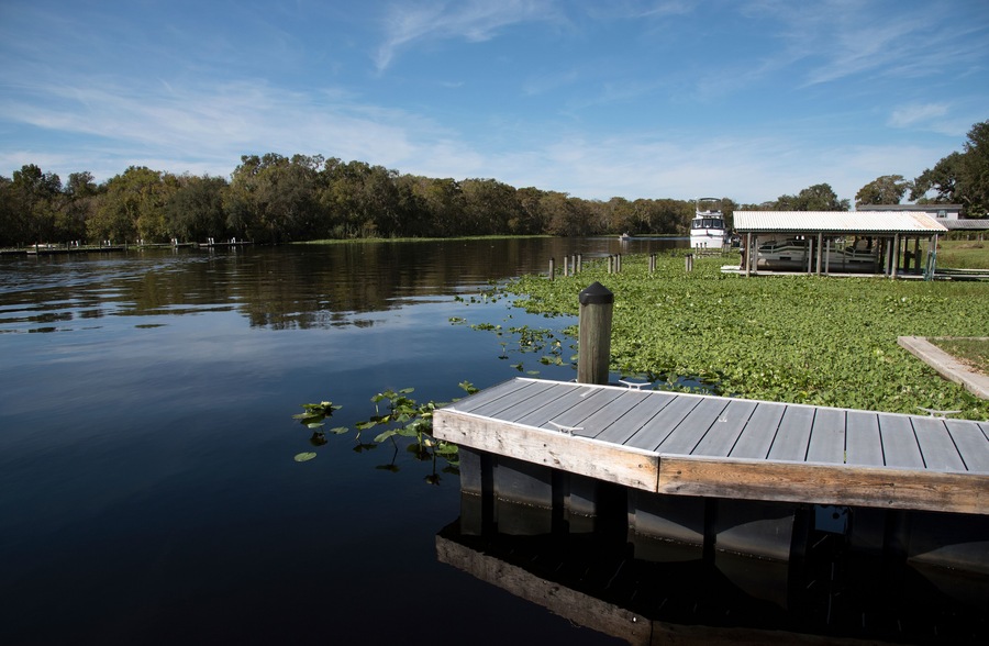 St Johns River in Volusia County Florida USA - October 2016 - A metal landing stage on the St Johns River close to DeLand Fl