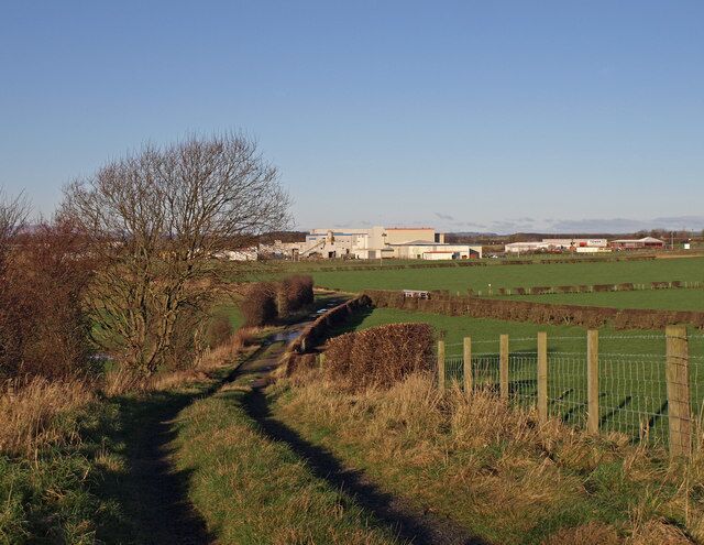 Farm Track, Dundonald Looking towards the Olympic Complex. The main factory being Lamar Products, supplying the printed circuit board industry.