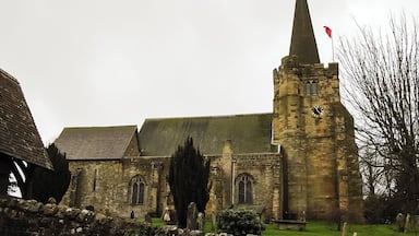 The Church dates from 1060 with a 12th/13th C. nave, and north aisle from 1250 - south aisle is 14th C. The chancel is 12/13th C. and may have had an apse, sedilia and piscina on south side of sanctuary are 13th C. The tower was added in the 15th C. The original timber framed spire was destroyed in the Great Storm of 1987 and was replaced with a steel framed version with chestnut shingles at 165 feet. The font is Norman and was lost for years until found nearby being used as a cattle trough! St Denys' church is well known for its wall paintings which date from 13th C. onwards. They were covered over and only discovered in 1893. There is an impressive 15th C. doom painting with Christ seated on a rainbow with the virgin Mary and St John. The Neville chapel is in the north east corner of the church, named after the Neville branch of the Abergavenny family who were Lords of the Manor from 1450. The church is a Grade I listed building.