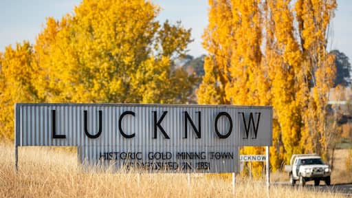 Lucknow which includes signage and tranquil scenes