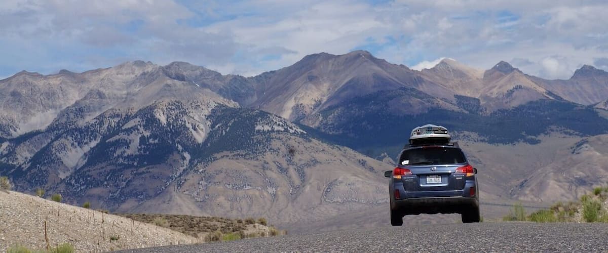 Miles from nowhere on one of the most beautiful roads in Idaho - somewhere halfway between Ketchum and McKay, ID on the beautiful Big Lost River. Borah Peak in the Lost Mountain Range looms big! #roadtrip
