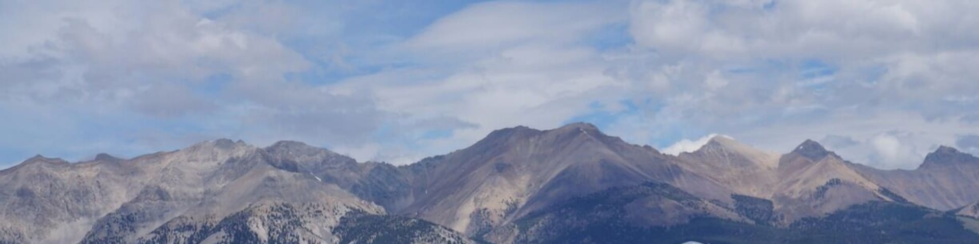 Miles from nowhere on one of the most beautiful roads in Idaho - somewhere halfway between Ketchum and McKay, ID on the beautiful Big Lost River. Borah Peak in the Lost Mountain Range looms big! #roadtrip