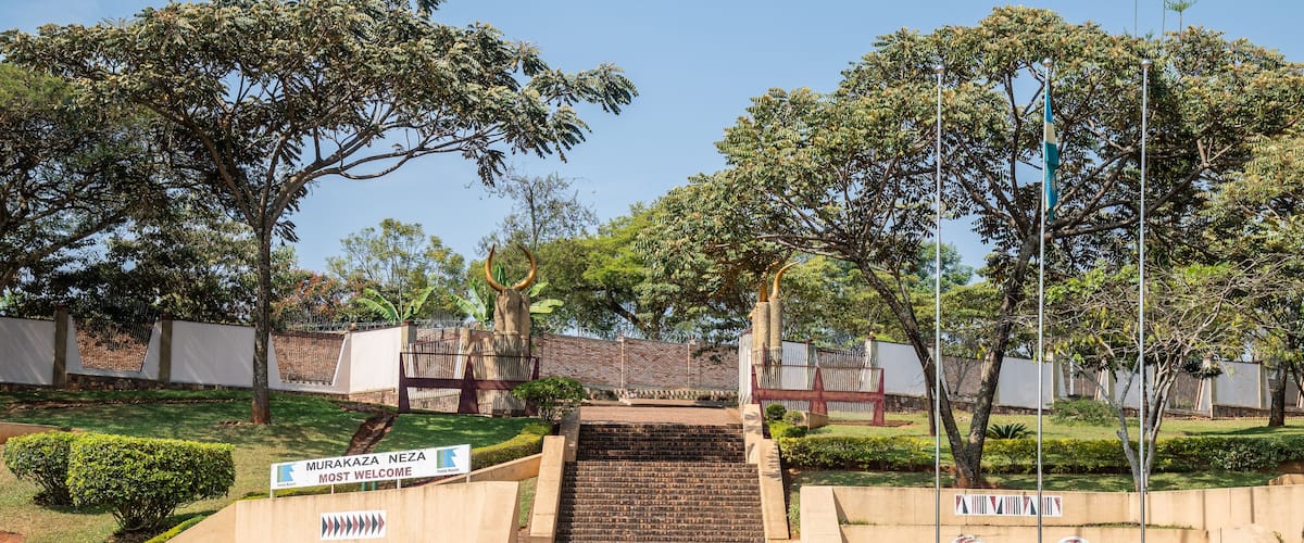 A set of stairs leading up to a building with a sign that reads "MURAKAZA NEZA MOST WELCOME".