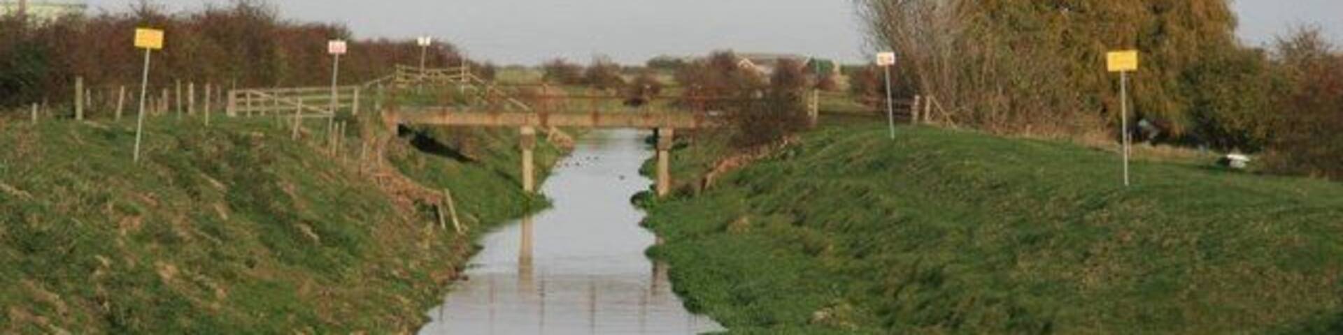 Tetney Drain This bridge links some farm buildings to Tetney village