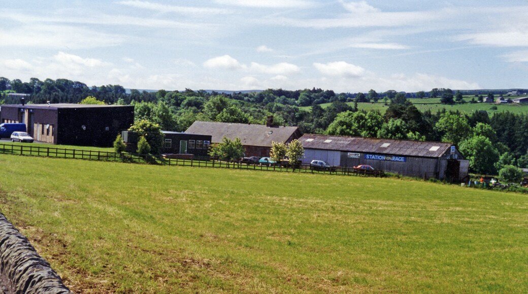 Site of Allendale station. View SW from B6303 road between Catton and Allendale Town in the valley of the River East Allen. The Allendale terminus of the ex-NER branch from Hexham had been ahead. It had closed eventually on 20/11/50, having lost its passenger service from 22/9/30.