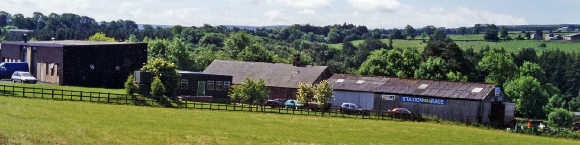 Site of Allendale station. View SW from B6303 road between Catton and Allendale Town in the valley of the River East Allen. The Allendale terminus of the ex-NER branch from Hexham had been ahead. It had closed eventually on 20/11/50, having lost its passenger service from 22/9/30.