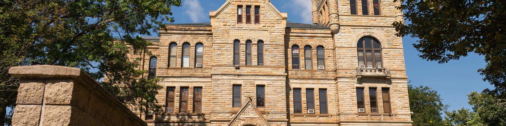 A historic courthouse with a clock tower and a sign reading "Knox County Court House."
