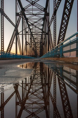 The old Chain of Rocks Bridge. Built in the late 1920s, it’s a mile long, and crosses the Mississippi River. It closed in the 1960s. nps.gov for more info.