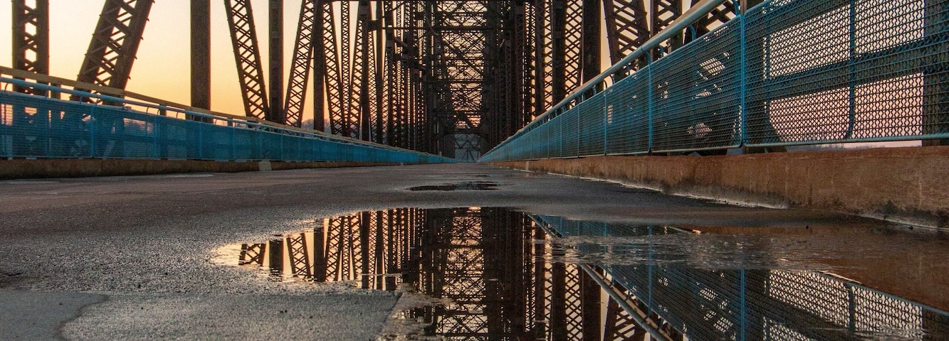 The old Chain of Rocks Bridge. Built in the late 1920s, it’s a mile long, and crosses the Mississippi River. It closed in the 1960s. nps.gov for more info.