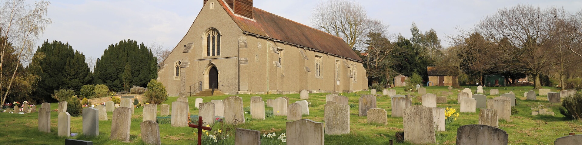 St Thomas' parish church and churchyard, Upshire, Essex, England, seen from the southwest