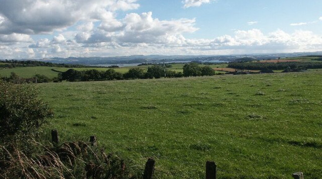 Pastures Old. Farm fields rolling down to sea level about three or four miles away. Looking toward the Bridges. If you look closely, the Superfast Ferry is on its way from Rosyth to Zeebrugge once more.