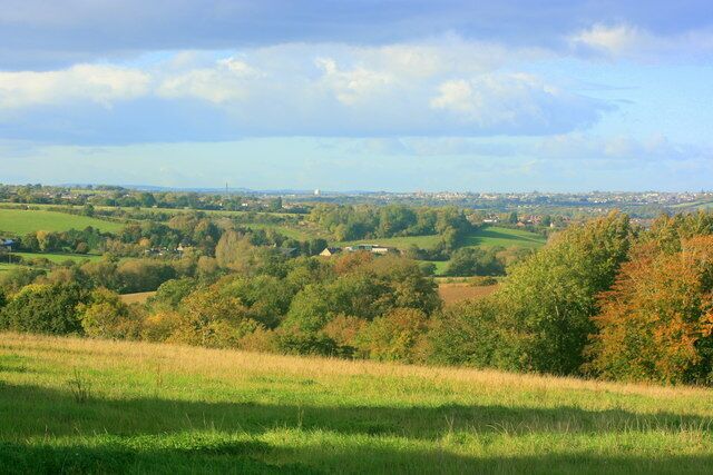 North from the road to Compton Dando Burnett lies to our right, Compton Dando to our left. East Bristol sprawls across the hill.