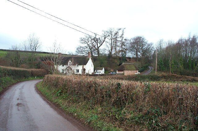 Catford Cottage. The cottage is next to a small stream and near the hamlet of Escott.