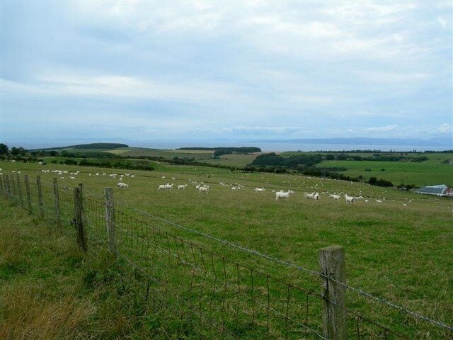 Clyde Farmland Looking west from the fields above Broadshean towards the Firth of Clyde. Arran and the Kintyre Peninsula can be seen in the background.