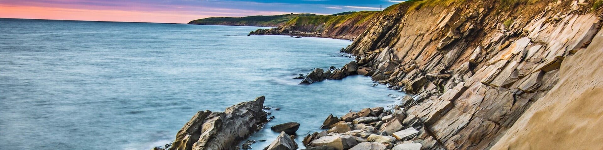 Rock formation lit by the sunset on our way to Cape Breton National Park. Make sure you have a good pair of shoes because you will need to go down a slope to get close to sea level. After that tons of cool photo to be discover. #BVStrove