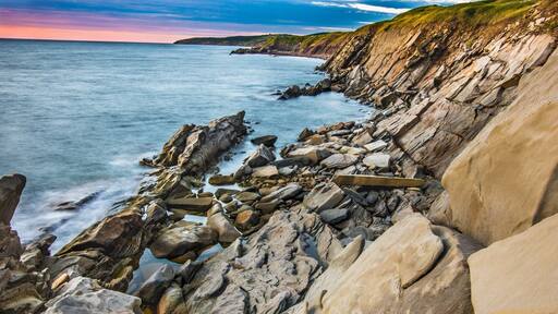 Rock formation lit by the sunset on our way to Cape Breton National Park. Make sure you have a good pair of shoes because you will need to go down a slope to get close to sea level. After that tons of cool photo to be discover. #BVStrove
