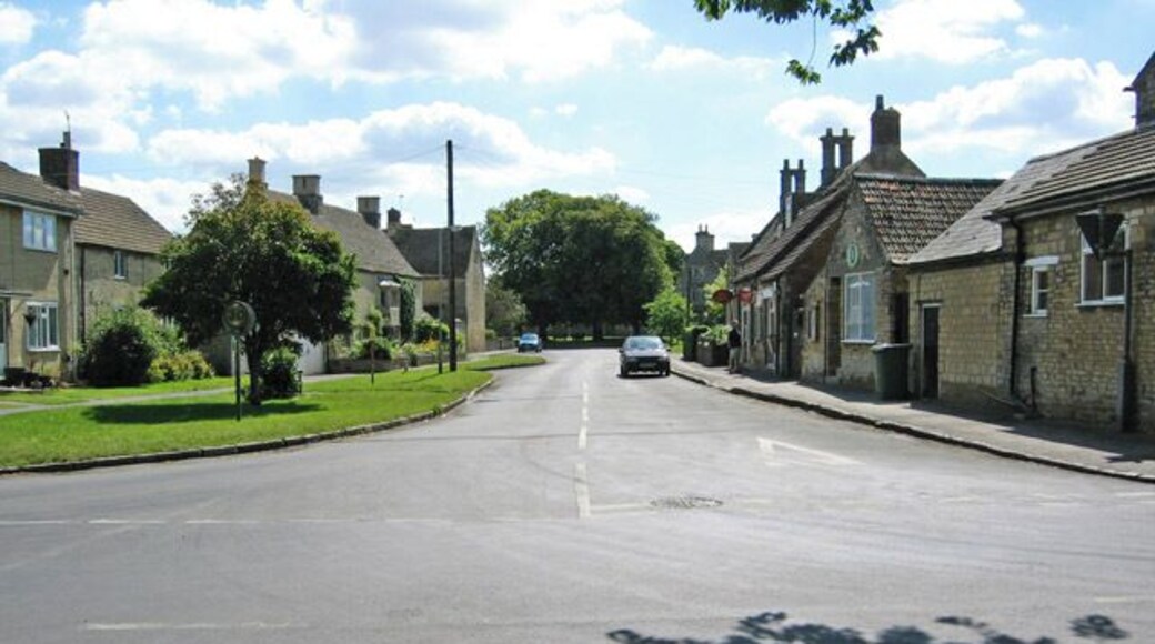 Market Overton, Rutland. Main Street: small stone cottages, large houses and the village post office and shop