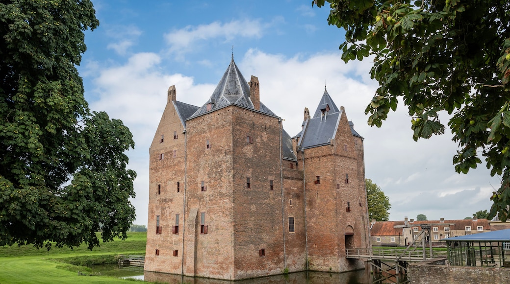 Slot Loevestein castle fort. medieval building used by military as a base as well as a state prison is now a museum and function centre for public access. historical landmark on sunny summer day