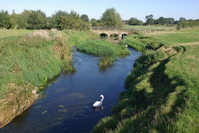 River Avon, Little Lawford Looking upstream towards the bridge carrying the Little Lawford - Long Lawford bridleway on a glorious September afternoon.