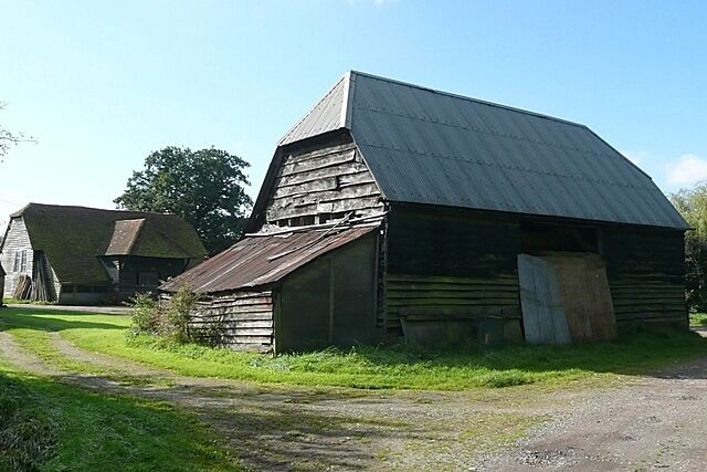 Two barns in the Chilterns at Scot's Farm, Stoke Row, Oxfordshire